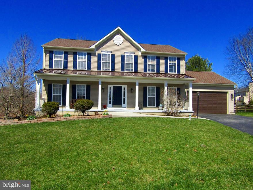 THE PROPERTY YOU'VE BEEN WAITING FOR IS FINALLY ON THE MARKET!  This amazing home is situated on a premium lot that backs to community open space, providing the best of both worlds...in front, a cul-de-sac street surrounded by lovely neighboring homes; and in the rear, a patio nestled in a private, tranquil setting with a sylvan view.    From the driveway, a winding walkway leads you to the covered front porch that runs the entire width of the house.   Once inside you will find BRAND NEW LVP on the first floor and BRAND NEW carpet & padding in the upstairs bedrooms and on the finished lower level...AND EVERY INTERIOR ROOM has been professionally painted--ceilings, walls, doors and trim...ALONG WITH the exterior shutters,  front door and garage door--and the mailbox post even matches the shutters.  This large house is a Classic Colonial with a twist--the exciting floorplan.   The front of the house boasts a traditional "center hall" style with a formal living room and dining room on either side of the center hall.  Then comes the twist--where the floorplan gets really exciting--with French doors separating the living room from the huge family room which is open to the upgraded kitchen and beautiful, sundrenched morning room nestled behind the kitchen.  The kitchen can be conveniently accessed from the center hall, the family room and the formal dining room. The open concept design of the back of the house seamlessly connects the kitchen to the family room, creating an ideal space for entertaining family and friends.  And let's talk more about the  MORNING ROOM.  This bright and cheerful area behind the kitchen has a wall of windows that overlooks the yard, greenspace and woods.  This can be your office, an additional dining area, a sunroom filled with greenery, a playroom -- you decide.  The kitchen and morning room design is the upgraded plan for the Yorkshire model that includes a large, curved island with additional cabinetry.  Other kitchen upgrades include ceramic tile floors, beautiful wood cabinets, S/S appliances with a 5-burner gas range, recessed lighting and a spacious pantry.  The laundry room comes with newer Kenmore Elite washer and dryer, and a handy utility tub; a window provides natural light and fresh air.  The 4 spacious  bedrooms have new neutral carpet and paint to compliment any color and style of your furnishings.  Both baths are original, but nice & roomy, and they can easily be upgraded to suit you style.  The lower level is huge with plenty of storage space for your myriad belongings, now and into the future.  The finished area comes complete with a Ping-Pong table, and a sliding glass door that takes you to the rear patio.  This is a large house in a wonderful neighborhood, and the owners have made many improvements in the last 5 years, INCLUDING 2 NEW HVAC UNITS (one in the lower level and one in the attic) to make this pleasing home comfortable for you and your loved ones.   Elk Creek Farms is located in beautiful Southern Chester County, where you are close to important conveniences (i.e. DESIRABLE AVON GROVE SCHOOL DISTRICT AND AVON GROVE CHARTER SCHOOL, medical facilities & pizza shops, and so much more!).  It's a pleasant drive to tax-free shopping in Delaware, Maryland and the Chesapeake Bay, and Lancaster County's many attractions.  The LOW ANNUAL HOA fee of $395 covers common area maintenance & insurance, and hydrants.