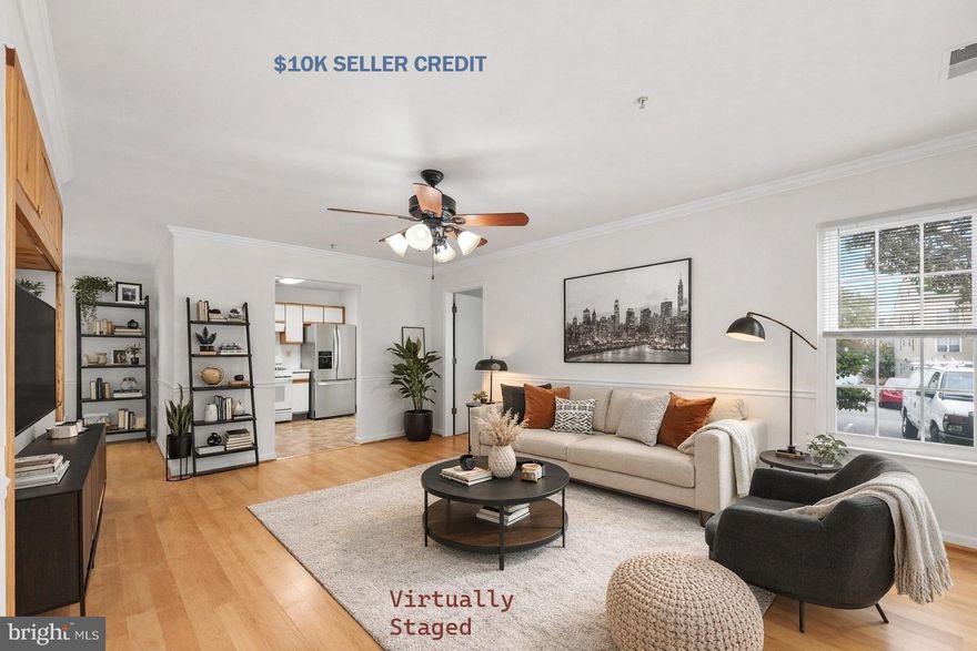 New adventure!   Welcome to easy, ONE-level living in this charming  main-level condo!   Adorable and well-maintained 2-bedroom, 2-bath main-level condo with a walk-out layout!  Essentially 2 owner suites! This charming home features a cozy covered patio just outside the sliding glass doors—perfect for morning coffee or evening relaxation. Each bedroom offers its own private bath, ideal for comfort and privacy. The kitchen is equipped with a newer refrigerator, dishwasher, and vent hood, and the interior has been freshly painted for a clean, updated feel.  A virtual rendering of the kitchen with new cabinets, counters, and flooring, and backsplash is in the photos.  A wonderful opportunity for easy living in a convenient location!    I-95 is a minute away, as well as shopping and other amenities nearby!

Enjoy the convenience of walk-in access—no stairs—and a thoughtfully designed layout that makes everyday living a breeze. This home includes one assigned parking space plus ample visitor parking for guests. Whether you're downsizing, investing, or buying your first home, this condo offers comfort, privacy, and a welcoming community. *** seller to offer $10k in closing costs***