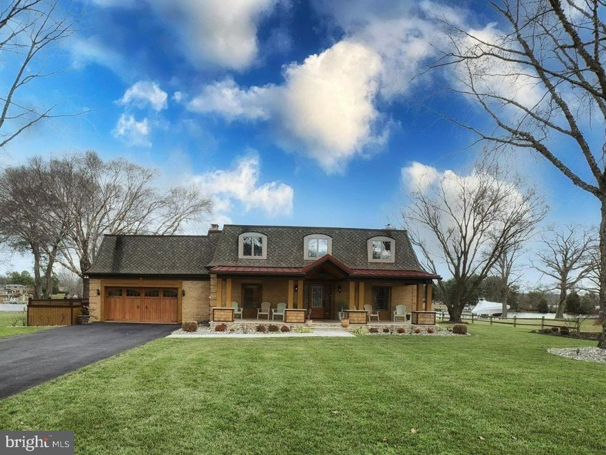 Welcome home to this waterfront property in the Belle Point Community. Looks can be deceiving - this coastal gem of a home has over 5,500 square feet of living space with the perfect floor plan for entertaining. High end appliances and gorgeous new countertops make up the gourmet kitchen that looks out over spectacular water views. Kitchen, dining, and living rooms flow seamlessly together and are ready for your next Summer party or family gathering. Large owner's suite with fireplace, great bath and walk-in closet. First floor bedroom with en suite bathroom. In-law suite/au-pair suite has its own private entrance with living room, fireplace, kitchen, bedroom, and full bath. This home features four fireplaces - plenty to keep you warm during the colder months!

Enjoy the expansive waterfront views from the brick paver patio, hot tub, or fire pit. New covered front porch, windows, and fencing in the last few years. The pier built in 2019 has LED lighting and a dual floating jet ski dock - ready for a summer of waterfront living! All of this and more on 215' of shoreline plus 4+ feet mean low water. 

The Belle Point community is conveniently located off Bennett Point Road, minutes to Route 50 and the Chesapeake Bay Bridge. Shopping, restaurants, medical center, golf, tennis, pickleball, and more are all located within minutes from Belle Point. Welcome home!