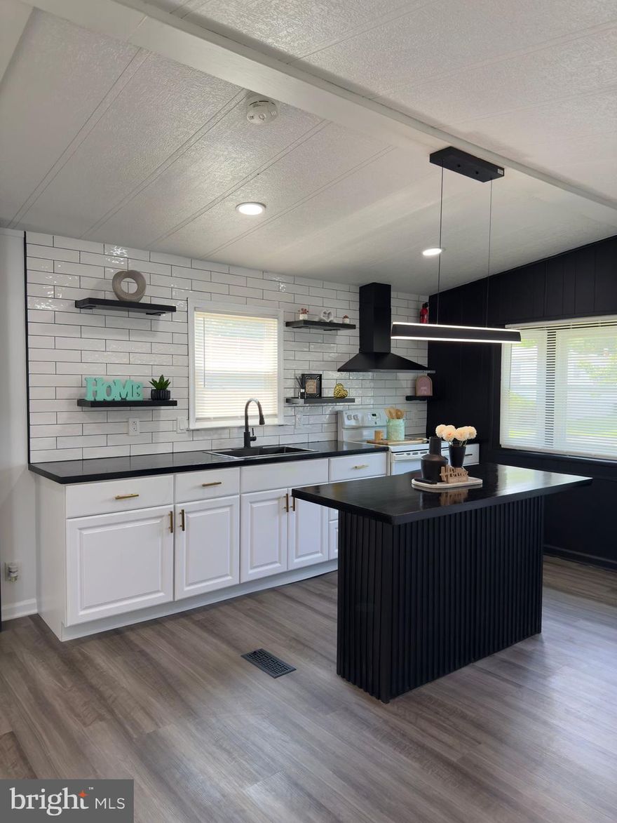 Welcome to 1957 Melvin Drive in the Harford Village Community.  This single wide mobile home has been renovated inside and out.  New flooring, kitchen, bathrooms and newer windows and newer HVAC are just a few of the upgrades this home has to offer.  Three spacious bedrooms and two full bathrooms makes this a perfect starter or downsize home.  Large open concept living room and kitchen great for entertaining and the large 10x20 deck with 10x12 awning is just another plus! 10x10  Storage shed is also included in the sale.  Community pool and playground also offered through the park.  Lot rent is $760.00 per month (buyer to verify with park).  Schedule your showing today!