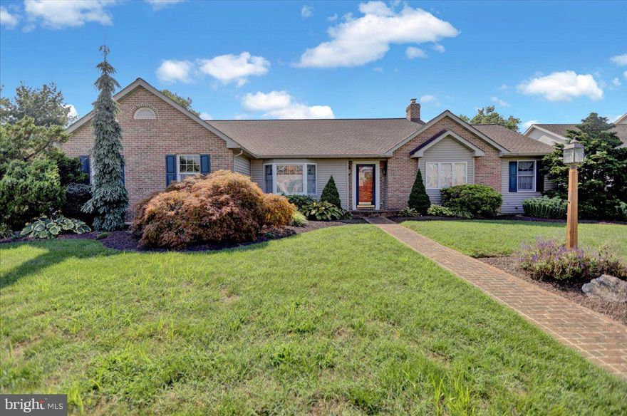 This brick and vinyl ranch style home has great curb appeal and is nicely situated on a .41 acre parcel in the highly regarded Wilson School District.  Convenient one floor living, with 3 bedrooms, 2 bathrooms, the garage, laundry and huge wrap around deck all on the main level.  The kitchen has 30 handle wood cabinetry, corian countertops, tiled backsplash, pantry closet and all appliances included.  Access the deck from the breakfast room, the sunroom or  the main bedroom.  A formal dining room features a bay window and hardwood flooring that runs through the foyer, great room, and kitchen/breakfast area.  The spacious master suite has a walk-in closet with closet organizers and an ensuite  bathroom with a jacuzzi tub and a stall shower.  Enjoy the  4 season sunroom which is bright and cheerful all year long. The roof was replaced in 2020 and the HVAC system was replaced in 2021.  The basement is huge and could be finished for expanded living area. The convenient location is close to schools, churches, restaurants,  doctor and professional offices and major roadways.