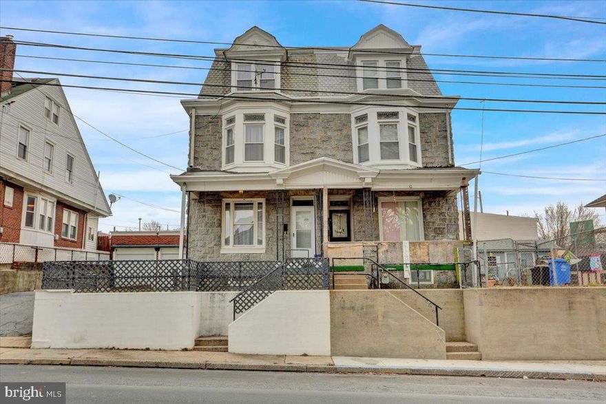 Two UNIT APARTMENT BUILDING,  currently part of HOUSING CERTIFICATE PROGRAM. Muhlenberg Schools.  FRONT has 4 bedrooms/REAR has 2 bedrooms.  Keep current program or live in one while your tenants help pay your mortgage.  Would also make fantastic In-Law site arrangement.   Individual Meters- Separate Heating.    Brand New Carpeting.  Freshly Painted. Enter to large living room and kitchen on first floor.  Second floor features 2 very nicely sized bedrooms and a full hall bath.  Third level has two more very good sized bedrooms.  All bedrooms have separate entrances.  Lower level laundry and storage.  Each apartment uses one garage.  REAR UNIT is a two bedroom with yard access.    Property also has a 2 CAR GARAGE.   This property currently accepts section 8 housing on rear unit.  Lease is month to month.  More remarks and interior pictures to follow.  Set up your showing now.  This property will qualify for 5% down conventional financing.  Call now for details.