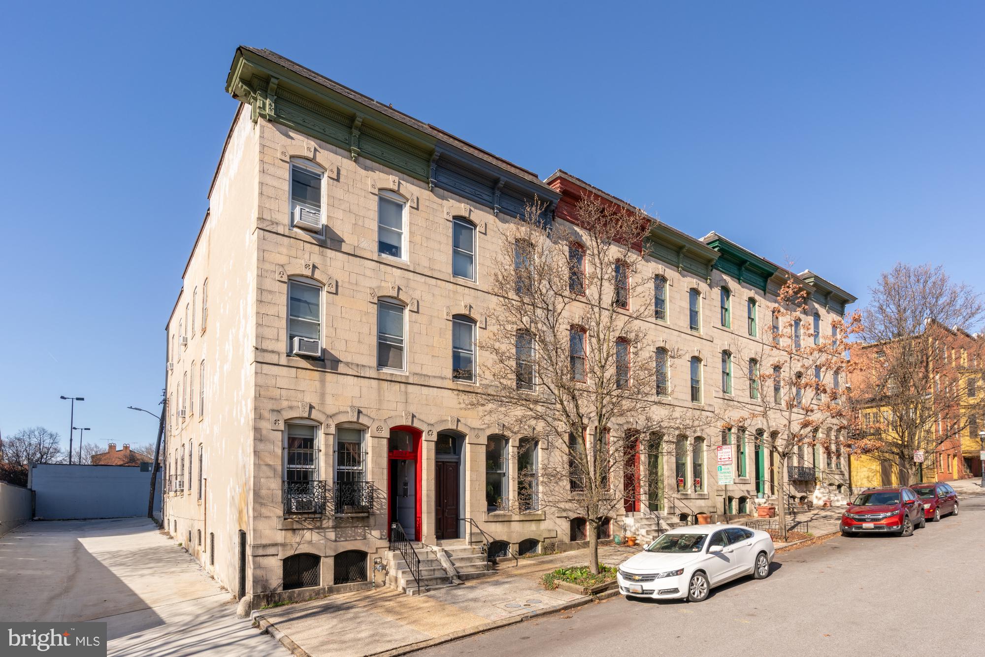 The Best of Bolton Hill! An absolute dreamy, expansive offering with SIX bedrooms and high ceilings, 1206 John Street’s original details have been meticulously preserved. Irreplaceable and priceless original details! Natural and magical light throughout from a skylight shaft and original, wavy glass windows. Original millwork and stairs, fireplace mantles, pocket doors, functioning transom windows, curved plaster walls, butler’s pantry turned half bath, and a surprise, built-in cocktail nook make this home exceptional. Restored and preserved by the previous owner, one of Baltimore’s premier heritage and preservationists, and lovingly brought to life with the current owners.
Designer and Instagram worthy touches include Benjamin Moore Newburg Green dining room, custom wallpaper in the art room / office, a writer’s nook overlooking the light shaft with windows opening from each level, and a view of Baltimore’s ICONIC gingerbread block across the street.
Recent updates include upper level laundry, energy updated to gas and oil tank removed, roof maintenance, and a blue stone English terrace with covered outdoor space for dining al fresco or napping in the middle of the city’s bustle. The home is in lower Bolton Hill – the closest you can get to all mass transportation and Mt. Vernon – perfect for local and DC commuters!
*6 Fireplaces total are decorative and sold AS-IS. Owners utilized the front parlor room wood-burning fireplace – this fireplace is also sold AS-IS.* The Property is located in a CHAP (Com. for Historical and Architectural Preservation) historic district within Baltimore City. *The Property is subject to the Midtown Special Benefits Tax*
Central to the cultural arts district, top restaurants, and Penn Station for NYC and DC access, 1206 John St mirrors art and design influences of a central city life. A stone’s throw from Bolton Swim and Tennis Club! A close-knit block, neighbors spend time stooping, walking to nearby Park Avenue fountains or John Street Park or for a communal greenspace, annual pumpkin carving, and free summer concerts. Enjoy restaurants The Tilted Row, Llama’s Corner, Cookhouse, On the Hill Cafe, Brass Tap and Angeli’s or nearby Station North which continues to come alive with recent additions such as Alma Cocina Latina, Foraged, Le Comptoir du Vin, The Royal Blue and mainstays such as Charles Theater and Tapas Teatro. Blocks from Mt. Vernon, BSO, The Lyric, I-83, Light Rail, Metro, and Penn Station.