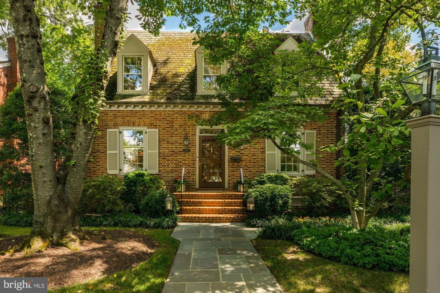 ***HOT NEW LISTING IN YORKTOWN VILLAGE!*** Rarely available Breuninger-built brick colonial designed after the Bracken House in Colonial Williamsburg! Imagine yourself coming home to a huge open-kitchen and family room overlooking a lush backyard and patio that will WOW you every time you walk in the door! Major expansion and beautiful renovation by CASE design also allowed for the addition of a generous and luxurious primary suite. This one-of-a-kind property has been meticulously maintained and improved over the years by its loving owners. Homes like this do not come up for sale often—this is truly an incredible opportunity that you don’t want to miss! 

You will fall in love with all the details, like the random-width hardwood floors with sunken nail heads, 9 foot ceilings, custom moldings, the extra-large powder room with stunning Chinoiserie vanity from Gump's and 3 gas fireplaces to dial in that perfect warm-cozy feeling. Ideal for entertaining, the floorplan flows effortlessly inside and out with a perfect balance of openness and defined space. The designer light-filled Gourmet Chef's Kitchen shines with natural stone countertops, island and counter seating, Subzero fridge, Wolf stovetop, Fisher & Paykel dishwasher, built-in ovens and warming drawer, and wine cooler. Plus, a mudroom, walk-in food pantry, and butler's pantry with KitchenAid dishwasher, cupboards, and more storage! Upstairs, the primary bedroom suite is a serene retreat with tray ceiling, large dressing room with custom closets, marble-floored bath with separate tub and shower, and skylight. Two additional bedrooms and a full bath complete the level, with pull-down stairs to a large, insulated attic for tons of storage. The lower level offers additional living space with gas fireplace, storage closets, laundry room, guest suite, full bath, and cedar closet. 

Outside, enjoy the curb appeal from front and back with a large landscaped yard, two patios, brick path, custom fence, single-car detached garage with automatic door, accessible stone ramp to side entrance, and custom exterior lighting throughout to create an impressive outdoor ambiance at night. Other highlights include zoned HVAC, gas, commercial insulation under addition, storm windows, plantation shutters, decorator blinds, and ceiling fans—all of which convey. Prime location nearly on the DC/MD boundary line with easy access to the popular Millie’s Spring Valley Restaurant, Friendship Heights Red Line Metro, and the Capital Crescent Trail. HURRY! THIS AMAZING OPPORTUNITY WON'T LAST LONG!