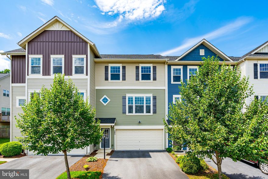 Fantastic 3-level, 3-bedroom, 3.5-bathroom townhome backing to the woods.  Over 2,500+ sq ft of beautifully finished living space.  2-car garage w/opener. Hardwood floors, granite countertops & center island in this open-floorplan kitchen & breakfast area. You will love this light-filled home!  Free access to community amenities including the swimming pool, tennis courts, tot lot, picnic pavilion, walking trails, and more!