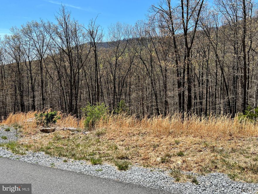 Beautiful lot in a well established community. Great location for  your dream home.   Rear of property borders Sleepy Creek Wildlife Management Area!  Class A FAMILY membership is available and the  $3150 initiation fee is waived!   Grinder pump is required when constructing the home.  Annual club dues are $2500. Private Club Amenities are not owned or operated by the HOA nor are their dues included in the HOA fees. Private Club Amenities include: Golf (Greens Fees), Driving Range, Chipping Green, Putting Green, Indoor Sports Center (racquetball, indoor pool, gym, aerobics room, laundry facilities, sauna, steam room, whirlpool, volleyball, indoor & outdoor tennis, indoor & outdoor basketball, shuffleboard, pickleball) , 2 Outdoor Pools, Clubhouse, Club Room, Baseball Field, Playground, Fishing Ponds. Other onsite amenities include: The Clubhouse Grille & Pub and the Sleepy Creek Spa & Salon.