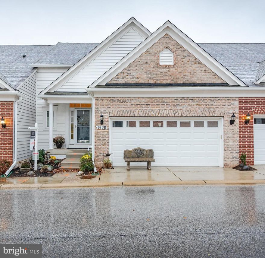 Gorgeous 55+ Pulte Morgan Model with extensive trim package in coveted Taylor Village boasts spacious open floorplan, Hardwoods on main level, Spacious owner's suite & finished LL! Expansive foyer & stately DR greet to chef's eat-in kitchen w/granite counters, 42" maple cabinets, and GE Profile appliance suite incl integrated Keurig in refrigerator for the coffee lover! Adjacent great room w/ gas FP, steps outdoors to a brick patio, backing to open common space. Owner's suite boasts WIC & attBA w/ granite double vanity & walk-in shower w/ bench seating! 2 bedrooms + loft in UL w/charming dormer window architecture.  LL rec room, full bath, and opt 4th bedroom/ bonus room! Energy*Pulte home. Tons of community amenities including indoor and outdoor pools, community center, tennis courts and more!