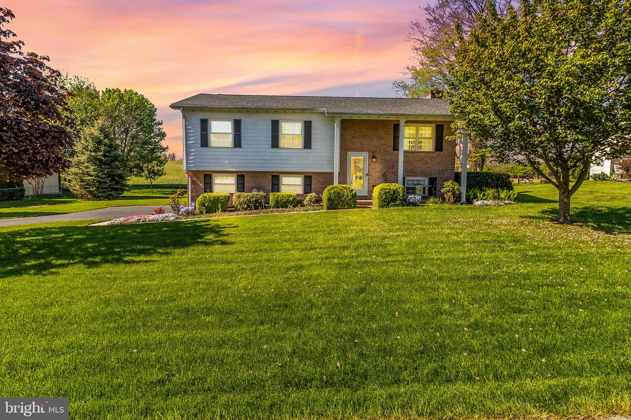 One-owner immaculately kept all-brick split foyer home — pride of ownership shines throughout! This beautiful home offers 3 spacious bedrooms, 2 full bathrooms — one on each level. Fully finished basement with bonus living space, and 1 cozy gas fireplace. Sitting on a large lot that backs to peaceful farmland, enjoy privacy and scenic views right from your backyard. Partially fenced yard offers a great space for pets, play, or entertaining. Plenty of parking with an oversized driveway! Major upgrades include a 5-year-old HVAC, and roof is only 4 years old! This home truly has it all — comfort, space, and smart updates. Don’t miss your chance to own this gem!