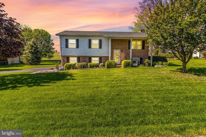 One-owner immaculately kept all-brick split foyer home — pride of ownership shines throughout!  This beautiful home offers 3 spacious bedrooms, 2 full bathrooms — one on each level.  Fully finished basement with bonus living space, and 1 cozy gas fireplace.  Sitting on a large lot that backs to peaceful farmland, enjoy privacy and scenic views right from your backyard. Partially fenced yard offers a great space for pets, play, or entertaining.  Plenty of parking with an oversized driveway!  Major upgrades include a 5-year-old HVAC,  and roof is only 4 years old!   This home truly has it all — comfort, space, and smart updates. Don’t miss your chance to own this gem!