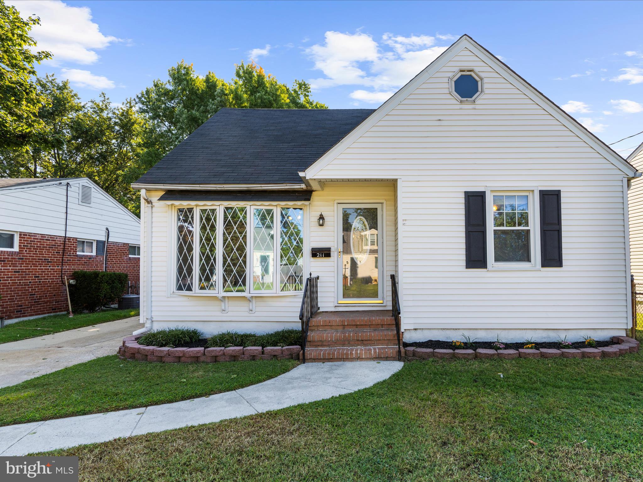 Charming 3-bedroom Cape Cod totaling over 2,400 sq ft in Riviera Beach and just blocks away from the water. The main level features original and refinished hardwood floors throughout. Spacious living room is highlighted by a bay window that fills the space with natural light. Two comfortable bedrooms and a full bathroom. The kitchen shines with stainless steel appliances, back-splash, ample cabinetry and durable tile flooring. Step through the sliding glass door into the inviting 11'x27' all-season room, complete with engineered flooring and recessed lighting. Upstairs, the expansive third bedroom includes a cozy sitting nook and additional storage closets. The finished basement adds even more living space with a large 25'x18' rec room with recessed lighting, plus a separate utility room offering laundry facilities and generous storage. The backyard has a shed and is a great setting for activities or grilling. New carpet and freshly painted. React quickly before it's too late!