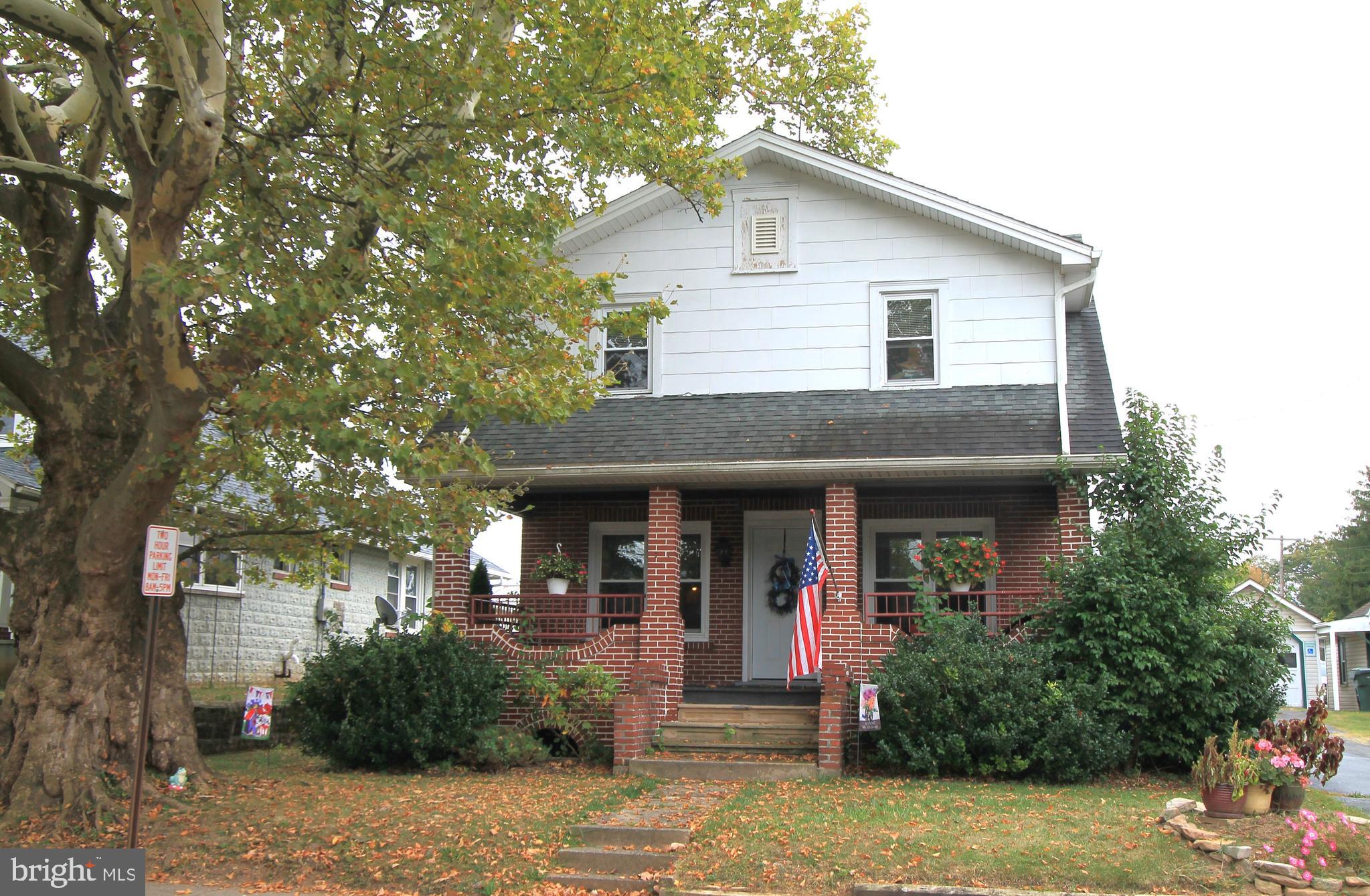 Welcome to this charming two-story home featuring 3 bedrooms and 2 full baths. Step inside to the main level where the bright and inviting living room flows seamlessly into the dining area and into the spacious kitchen. The home showcases rich hardwood floors, while the kitchen offers tile flooring, abundant counter space, and plenty of cabinetry – perfect for everyday living and entertaining. A thoughtful back addition provides a convenient laundry room combined with a full bath and a beautiful foyer that opens to the expansive backyard with a deck and patio, ideal for gatherings and outdoor entertainment. Upstairs, you’ll find 3 comfortable bedrooms and a large full bath featuring double vanity and elegant tile work. Relax on the lovely front porch or take advantage of the detached one-car garage for parking and storage. This home offers a wonderful blend of character, space, and functionality – ready to welcome its next owner!