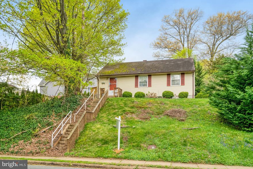 New Improved Price!  Perched high above the neighborhood, this exceptional homesite offers commanding views of the city—a perfect canvas to bring your custom dream home to life. The existing structure is not habitable and cannot be shown! The true value lies in the land and its unparalleled potential. Enjoy a private, serene backyard framed by mature Arborvitae trees for built-in privacy and a striking Japanese Maple that adds natural beauty and character to the landscape. The owner has replaced gas and water lines from the street. Date is unknown. Located in the highly desirable Pimmit Hills community, you'll love the tree-lined streets and unbeatable access to Tysons Corner, Washington, D.C., Metro stations, premier shopping, dining, and major commuter routes.