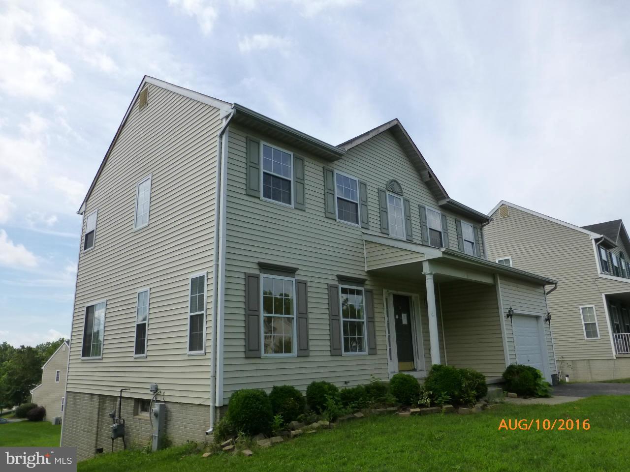Corporate owned Prop. Sold AS-IS. 3 BD, 2.5 BA Colonial located in Kenwood Park. Kitchen with an island & sliding to a deck for outdoor activities. Living Room w/ FP. Master bedroom with a walk-In closet. Master bath features separate shower. Expanded 2nd floor w/open space great for an office. Finished LL w/ walk-out to a back yard and plenty of storage. Convenient location, Close to I-95 & I-695