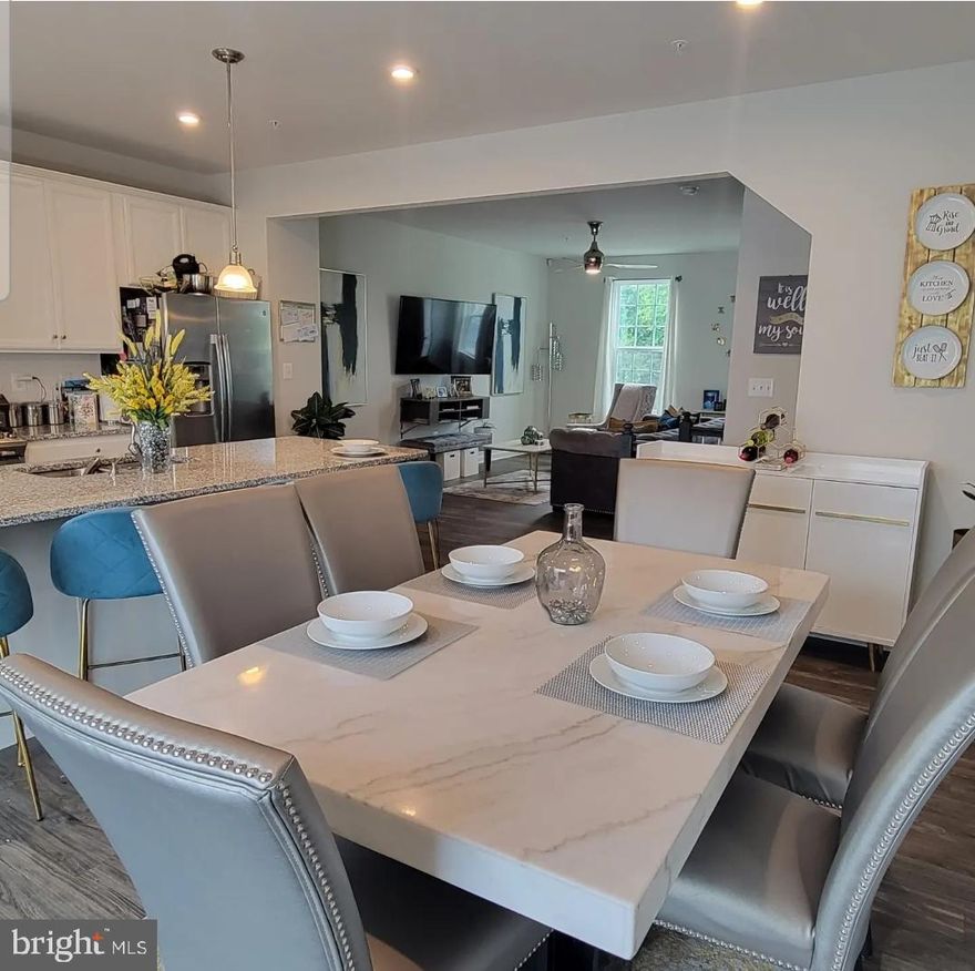 Welcome to this beautifully maintained 3-level townhome, built in 2020 and thoughtfully designed with modern living in mind. Featuring 3 spacious bedrooms, 2 full baths, and 2 half baths, this home offers both comfort and functionality across every level.

Step inside to find upgraded finishes throughout, creating a sleek and contemporary feel. The open-concept main level is perfect for entertaining, seamlessly connecting the living, dining, and kitchen spaces. The kitchen is a true highlight, boasting modern touches and ample space for cooking and gathering with a large 4-5 person island.

Enjoy outdoor living on your deck—ideal for relaxing or hosting guests. Additional features include a 2-car rear-entry garage, providing convenience and extra storage.

Energy-efficient leased solar panels add long-term value and potential savings, making this home as smart as it is stylish.

Located in a desirable community just minutes from Interstates 695, 895, and 295. Cedar Hill Community offers a modern clubhouse, fitness center, and pool! This move-in-ready home offers the perfect blend of comfort, efficiency, and modern design. Don’t miss your opportunity to make it yours!