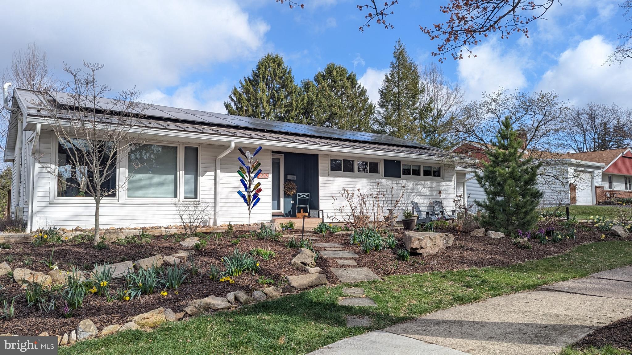 Simply Marvelous! Lovingly and meticulously updated ranch home in the State College Borough South neighborhood. Less than 1 mile to campus and downtown. Mid-Century modern character with 21st century comforts. Peruse the photos and imagine your family, friends and loved ones sharing quality time and making memories. Central heating and cooling with vehicle charging supported via a modern solar system. Beautiful hardwood floors throughout. Full walkout lower level with cozy family room, guest bedroom and full bath opens to large private yard with garden area. Relax on the oversized deck and enjoy the amazing sunsets. An opportunity to live happily ever after. Welcome Home.