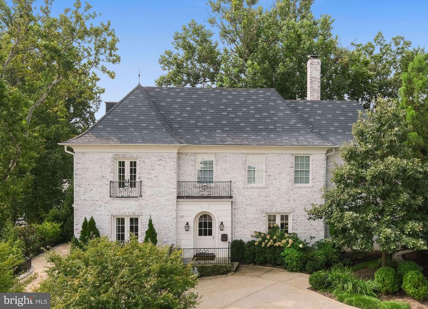 Originally designed by Barnes Vanze Architects and expertly crafted by Zantzinger Built, 2101 Foxhall Road NW is an exceptional French-style residence beautifully set on just over a quarter acre in coveted Phillips Park. Complete with timeless finishes, quality millwork, and a perfect floor plan suited for a growing household, this spectacular showpiece is second to none. Carefully considered and thoughtfully planned, the Main Level of this home hosts all of its entertaining spaces. Beginning with the incredible Foyer that is anchored by the formal Living and Dining Rooms, the generous rooms are graciously welcoming. A private office is nestled past walls of built-ins and features three sets of French doors that open to the yard. Expansive and airy, the Gourmet Kitchen and Breakfast Area is open to the huge Family Room and boasts three sunny exposures which flush the large space with natural light. Three Bedroom Suites are sequestered on the First Upper Level and includes an exquisite Primary Suite that is graced with a spa-Bath and 2 Walk-in Closets. There is a central Lounge on the First Upper Level that is ideal for a Playroom, Home Classroom, or Game Room. The Second Upper Level has two Bedrooms, one Full Bath, and a Sitting Room. The Lower level has access to the attached Garage and also includes a Recreation Room, Bedroom, and a Full Bath.