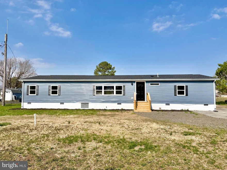 The renovations have just been completed on this Class C manufactured home located just south of Milford.  This home features an open living space with a split floor plan including 3 nice-sized bedrooms and 2 new baths.  The central living space features an island kitchen with quartz counters and both pendant and recessed lighting and new stainless appliances, a large living area and an adjacent dining area.  The natural lighting is great!  The home is situated on a level 0.35 acre lot that is just waiting for your personal touches.  Take a look today!