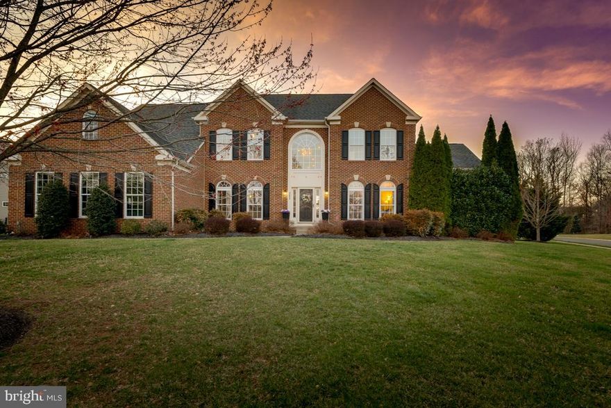 Fully Available. Exquisite Executive Home on a Premium Corner Lot in Brookside

This immaculate and meticulously maintained corner-lot estate is a rare find, set on over half an acre in the highly sought-after Brookside community. Nestled against a backdrop of lush trees, this home offers a private oasis with unparalleled elegance and comfort.

Step inside to be greeted by gleaming hardwood floors that flow throughout the main level and a dramatic two-story foyer. The formal living and dining rooms are adorned with upgraded crown molding and bathed in natural light, while the main-level office features French doors and a charming bay window overlooking the serene backyard. A stunning sunroom with walls of windows extends off the living room, providing a tranquil retreat.

The family room boasts a soaring two-story ceiling and a floor-to-ceiling stone fireplace, creating an inviting space for relaxation. The rear staircase leads to the gourmet kitchen, complete with upgraded granite countertops, high-end stainless steel appliances, and a butler’s pantry. Adjacent to the kitchen, the morning room offers an open, sunlit space perfect for hosting gatherings. The three-season screened-in porch overlooks the beautifully landscaped backyard, adding even more space to enjoy the natural surroundings.

Upstairs, the luxurious primary suite features hardwood floors, a private sitting area, a spa-like bath with a jetted tub and separate shower, and an expansive walk-in closet. Three additional spacious bedrooms each offer direct access to bathrooms, ensuring comfort and convenience.

The fully finished lower level is a true entertainer’s dream, featuring a large recreation area with a fireplace, a hardwood-floored game room with a built-in bar, and an office nook with custom bookcases. A den, perfect for use as a fifth bedroom, includes an en-suite full bath. Additionally, a flex space can be used as a home gym or media room.

Located on the DC side of Warrenton, this home offers easy access to commuter routes. The Brookside community provides a wealth of amenities, including 1,000 acres of nature-filled space, four spring-fed lakes, catch-and-release fishing, miles of walking and biking trails, an outdoor pool, tennis courts, and a recreation facility.

Don't miss the opportunity to own this extraordinary home in one of the area's most desirable communities!