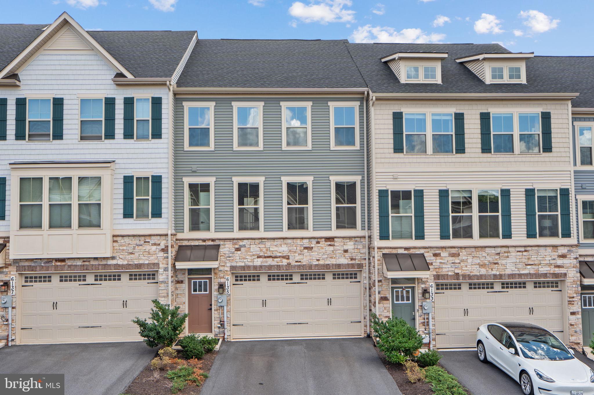 Step into this nearly new, well‑appointed townhouse featuring a gourmet eat‑in kitchen with a generous island, stainless steel appliances, 42″ cabinets and pantry—all paired with an open-plan layout that invites seamless living and entertaining. The home boasts stylish finishes such as recessed lighting, luxury vinyl plank and ceramic tile. The basement family room walks out to a deck and backyard, while the upper level houses the laundry and spacious bedrooms.