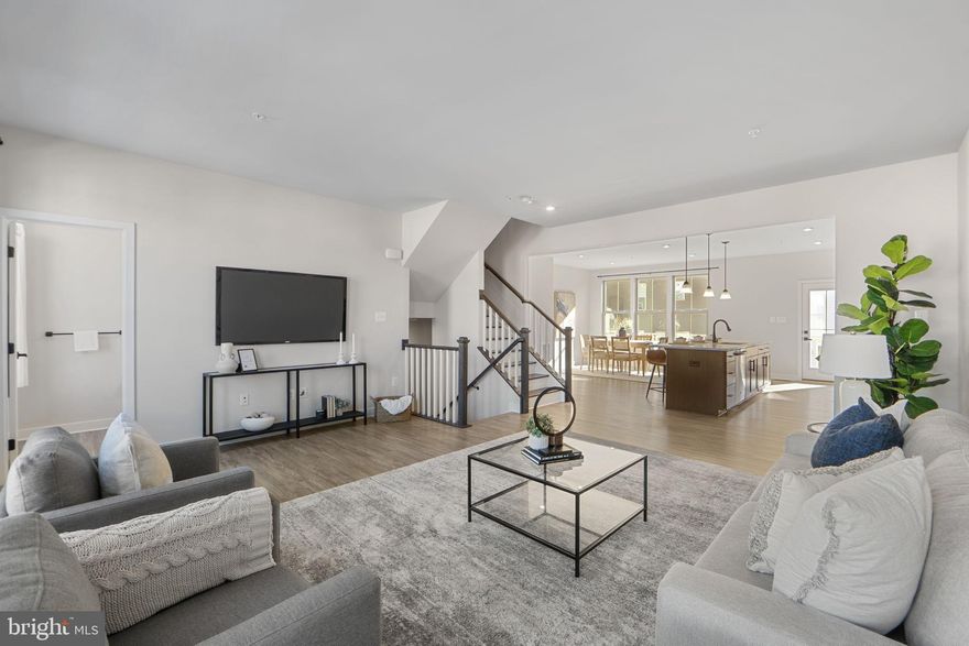 Step into this nearly new, well‑appointed townhouse featuring a gourmet eat‑in kitchen with a generous island, stainless steel appliances, 42″ cabinets and pantry—all paired with an open-plan layout that invites seamless living and entertaining. The home boasts stylish finishes such as recessed lighting, luxury vinyl plank and ceramic tile. The basement family room walks out to a deck and backyard, while the upper level houses the laundry and spacious bedrooms.