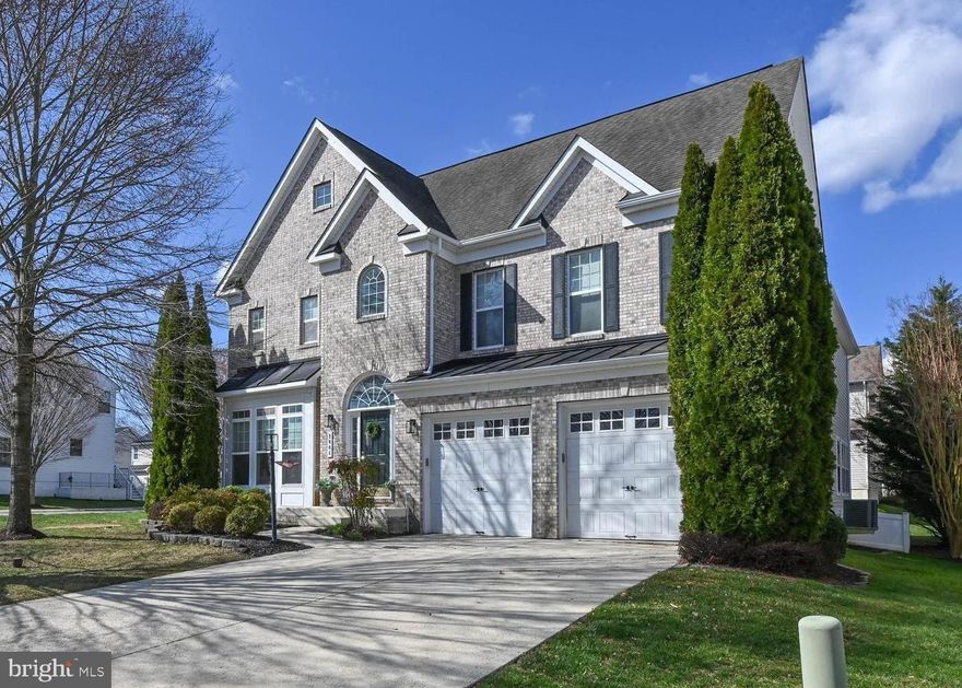 Welcome to this stunning 5/6 bedroom, 5-full-bath brick front Colonial in the highly sought-after Monticello neighborhood. Perfectly situated on a fenced corner lot, this home offers both privacy and convenience, and is just minutes from shopping, major commuting routes, and downtown historic Annapolis!   Enjoy the amenities of a community pool, dog park, community trails and the spaciousness of an open floor plan that features an upgraded kitchen, formal dining & living rooms, and a dramatic two-story great room with a gas fireplace.  The attached flat screen TV conveys!  There is also a  MAIN Level bedroom (or office) with a full bath, and a delightful breakfast room and sunroom. A large deck off of the kitchen for your family bar be que too!
The luxurious and spacious primary suite features a tray ceiling and dual walk-in closets. The bath features a soaking tub and oversized shower.  Three additional guest bedrooms upstairs. The fully finished walk out lower level provides a media theater room and ample unfinished storage space. 
Tastefully landscaped w/ an underground sprinkler system and nice curb appeal.
Recent improvements include: 22 new windows, exterior lighting (2024), new water heater (2023), new rear fence, landscaping, W & D, and refrigerator (2022). The front foot fee is PAID OFF!
This property offers an incredible value and is truly a must-see for anyone looking for a perfect blend of comfort and location.