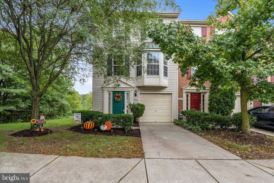 4 bedroom end unit in coveted Elkridge! Beautiful home situated on a private lot that backs to trees, has a large fenced in yard and sits on a corner lot. Huge grassy area that can be used almost as your own.  As you enter you are greeted by a spacious foyer, a powder room.The first floor can be used as another living space, gym, office or playroom. You will also find the large 4th bedroom that has a gas fireplace for those chilly nights.  This easily can be taken down to convert that space into one big living space. The upper level has wood floors and a beautiful architectural wood decorated wall that makes this show beautifully!  The eat in kitchen has an island for extra storage and makes kitchen cooking a breeze.  The bump out gives you extra space for an office or a separate quiet sitting area. The dining area leads out to a deck that over looks trees and a large grassy area- perfect for unwinding after a long day.  The upper level has 3 bedrooms, including the large primary bedroom. The primary bedroom is complete with 2 walk in closets a Large en suite that has a soaking tub and a stand alone shower.  This home has loads of storage and is in a prime location.  Central to major hwys, top rated schools, and shopping.  Don't miss this stunning home! Carpet is getting stretched prior to closing.