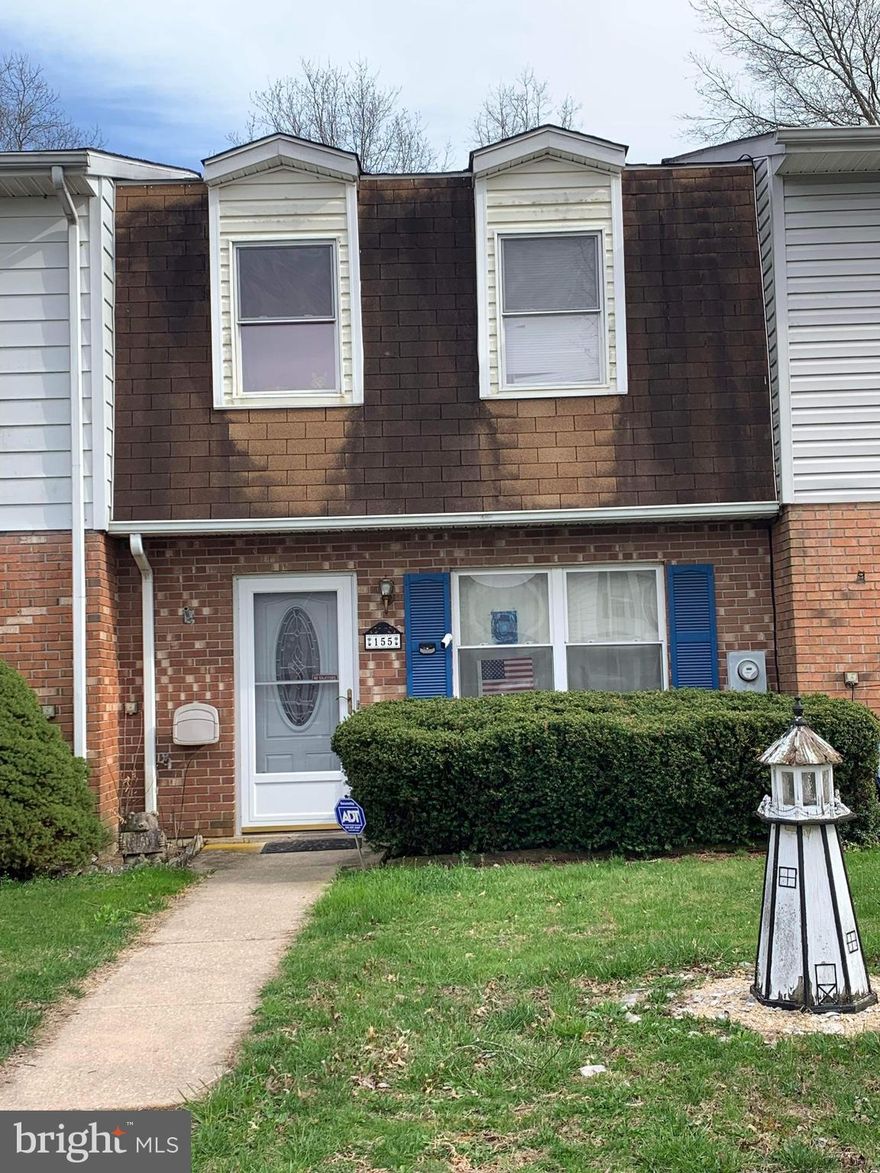 Easy affordable living in this 3 bedroom town home with 1  1/2 baths.   All appliances convey including newer washer, dryer and refrigerator.  Spacious living room with window providing natural light. Eat in kitchen with pantry and all appliances.  Main floor laundry.  Back yard is fenced and backs to open space.  Storage shed and newer awning over patio.   Being sold strictly in "AS IS" condition.