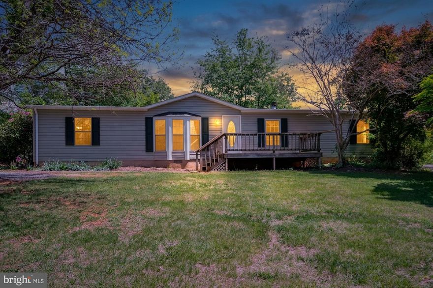 Discover the charm of this delightful ranch-style home, nestled on a generous 4-acre lot in the serene countryside of Culpeper County, Virginia, offering a perfect blend of comfort and functionality. With 1,620 square feet of thoughtfully designed living space, this residence features four spacious bedrooms and two full bathrooms, ensuring ample room for relaxation and privacy. Step inside to find a warm and inviting family room that seamlessly connects to the kitchen, creating an ideal space for gatherings and everyday living. The inviting living room is complemented by a cozy wood-burning fireplace—ideal for crisp Virginia evenings. For more informal gatherings or quiet relaxation, the separate family room offers an additional retreat. With high-speed cable internet available, you can effortlessly work from home while enjoying your peaceful surroundings.The kitchen is equipped with essential appliances, including a gas stove, refrigerator, and dishwasher, making meal preparation a breeze. Enjoy your morning coffee in the cozy breakfast area, bathed in natural light. The primary suite boasts a luxurious soaking tub and a walk-in shower, providing a serene retreat at the end of the day. Additional highlights include beautiful hardwood floors, plush carpeting, and tasteful window treatments throughout, enhancing the home's inviting atmosphere. Outside, the expansive lot features a tranquil stream, perfect for enjoying nature's beauty. Outdoors, a quiet creek borders the property line and there are three well-maintained sheds provide extra storage or potential workspace options. Whether you're savoring morning coffee on your porch as deer meander nearby or exploring the possibilities of outdoor activities on your property, this delightful abode promises all the charms of rural life with contemporary amenities just minutes away. Come discover your haven in Culpeper!