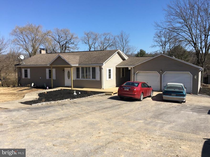 One floor living in a country setting outside of Middleburg, 2 bed/ 2 bath home w/ 8.85 acres with mix of fields and wooded area. Great for hosting outdoor activities- includes a picnic grove with a pavilion, BBQ pit, picnic tables,& streams.Barn could be used for different animals, fields on the property to make your own hay. Grow your own fruits & veggies! Large master bedroom suite with walk in closet & master bath w/ jacuzzi tub, open kitchen/dining area, 2 car garage, full basement, wood/coal stove for efficient heating plus oil furnace.