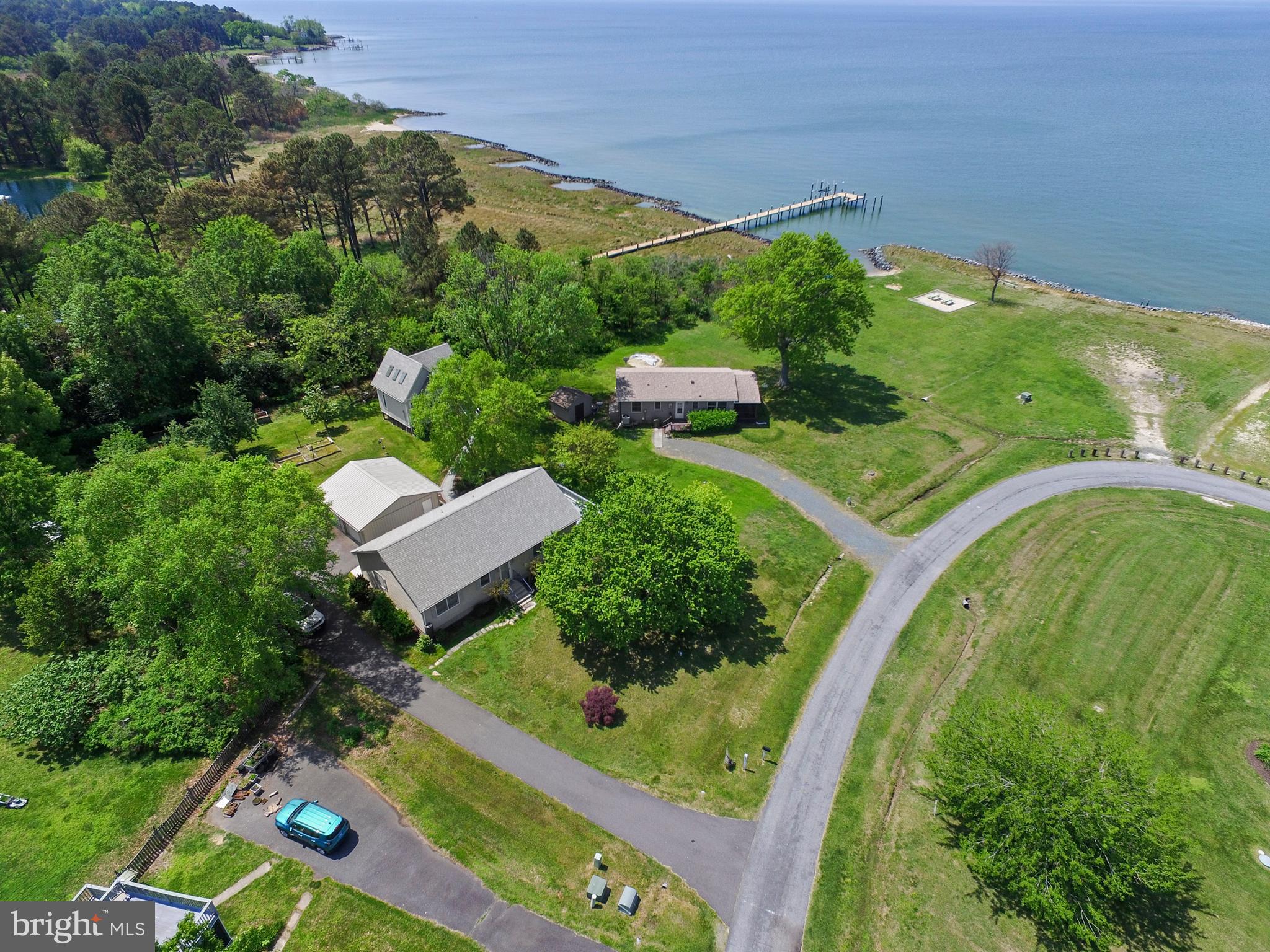 Bay Breezes & Beautiful Views: Your Tilghman Island Haven
Waterview Living with Room to Breathe on Maryland's Eastern Shore
Step into the good life at 5379 Anchor Road, where Chesapeake Bay magic meets everyday
comfort. This charming home in Tilghman's friendly beach neighborhood sits just a
short stroll from the community beach where neighbors gather and memories are made.
Picture yourself unwinding on the deck with morning coffee, watching the sun sparkle across the
bay waters. Inside, the welcoming home greets you with warm hardwood floors throughout, two
comfortable bedrooms, and two full baths. The kitchen is a joy to cook in—featuring granite
countertops, stainless appliances, and beautiful hand-crafted wood cabinets perfect for whipping up
fresh seafood dinners or casual breakfasts before heading out to explore the water.
What makes this place truly special is the adorable guest cottage built in 2017. This sweet retreat
offers a screened porch with more water views, its own heating and cooling, and a half
bath—perfect for visiting friends or your own creative escape when you need a moment to
yourself.
For water lovers, you're in paradise—grab your kayak or paddleboard and launch right from your
backyard. Gardening opportunities abound-whether ornamental or the fun of your own fresh
summer veggies-the property also includes fruit trees -pies and jams in your future?
The practical perks are all here too: a roomy two-car garage with workshop space for projects,
outdoor shower for rinsing off sandy feet, beautiful landscaping, plus recent updates including a
new roof (2018) and HVAC system (2016) so you can relax knowing the essentials are taken care of.
Beyond your doorstep, discover the authentic charm of Tilghman Island. A short, scenic drive
connects you to the fabulous restaurants, shops and galleries of St. Michaels, Easton, and Oxford.
When you choose this Tilghman Island home, you're investing in more than just real estate—you're
gaining a lifestyle where stress melts away with each bay breeze and sunset. Whether you're looking
for a full-time home with vacation vibes, a weekend getaway from the city grind, or the perfect spot
to eventually retire and watch the osprey soar, this special place offers what so many of us are
searching for—a chance to slow down, breathe deeply, and connect with the beauty of the bay.
Come see what life on Tilghman time feels like. Your Eastern Shore story is waiting to begin.