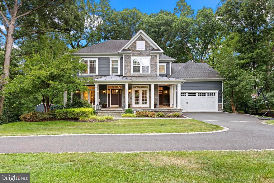 2013 custom construction with $90,000 of additional upgrades in the past 5 years.   This home is the floor plan of your dreams!!  Main level offers formal dining and living rooms + office.  Entire back of home is an open concept kitchen, family room, and morning room with french doors that walk out to expansive 60 ft deck.  Friends & family side entrance + oversized 2 car garage walks into mudroom with built ins.  Designer grade white kitchen cabinets, marble tile backsplash, double ovens, gas cooktop, beverage fridge!  Real hardwood floors throughout entire main level, staircase, upper level hallway, and primary bedroom. 
 Hardie plank and stone exterior.  Upgraded french doors with transoms are found on the front porch, back deck, and walk out lower level.  Extensive moldings and millwork throughout the home. Upstairs, you'll discover three generously sized bedrooms, each with their own bathroom, and a primary bedroom with a private ensuite bathroom and a walk-in closet. This bedroom level also hosts the separate laundry room! Outside, the property features a private backyard oasis, providing a serene setting for outdoor gatherings and relaxation. The landscaped yard is well-maintained and offers plenty of space for gardening or outdoor activities. Additionally, the back deck is perfect for hosting barbecues or enjoying a morning cup of coffee. This home offers easy access to nearby parks, tennis and pickleball courts, Hollin Hall shopping center, restaurants, and a quick commute to Old Town Alexandria, Pentagon, Ft. Belvoir, and Washington DC.  Located in Waynewood Elementary! Walk to Hollin Hall Shopping Center, pre-schools, and GW Bike and walking path.