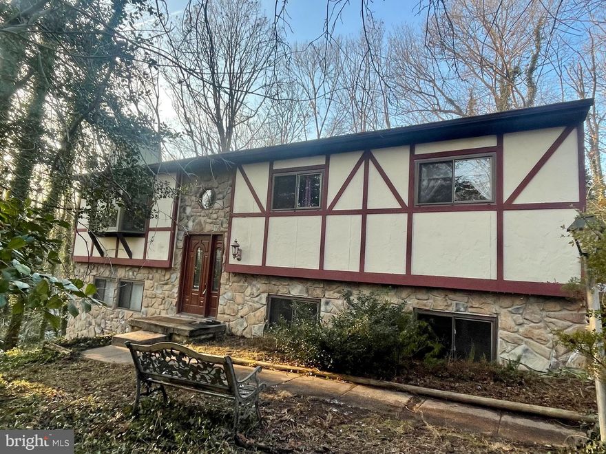 OPEN HOUSE CANCELED !!! 3D tour ADDED. Beautifully updated single family home. 4 bedrooms, 3 full baths. Vaulted ceiling in the living room.  Updated kitchen with granite countertops, SS appliances,  designated dining area, glass door to the deck overlooking trees. laminate/LVP flooring. Owners suite has recently updated attached bath. 2 more bedrooms and 1 full bath on the upper level. 4th HUGE bedroom and recently added full bath in the basement. Spacious family room with pallet stove and walk out to the backyard.  Lots of storage. Shed on the backyard. Roof was just recently replaced. HVAC Geothermal is only 2 years old, new doors, recently redone driveway. Almost 1 acre private lot. Blue ribbon schools. Conveniently located near major routes, shopping dining, NSA and Fort Meade.