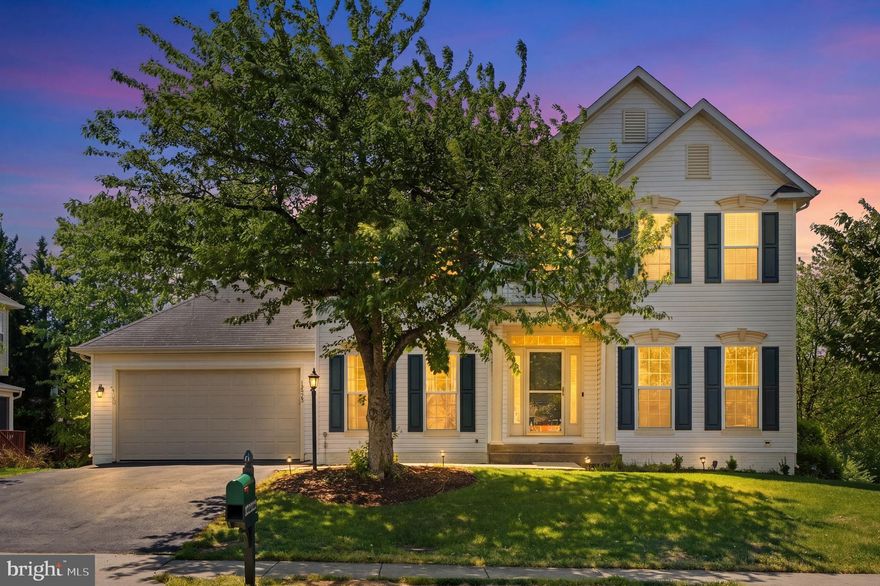Fantastic single-family home on an almost quarter-acre corner lot and cul-de-sac!   Popular Yardley model boasts a dramatic two-story foyer with a side staircase creates a bright, open feel from the moment you enter. The versatile living room can easily serve as a home office, while the separate dining room is perfect for hosting formal gatherings.  The sun-filled family room lined with transom windows and a cozy fireplace, seamlessly connects to the charming kitchen, which features white cabinetry, granite countertops, and stainless steel appliances.  Upstairs, you’ll find four spacious bedrooms, including a stunning primary suite with an elegant tray ceiling, a large walk-in closet, and a pristine ensuite bath featuring a soaking tub and separate shower.  The expansive lower level offers luxury vinyl plank flooring throughout, recessed lighting, a full bathroom, a built-in buffet bar, and walk-out access to the backyard—ideal for entertaining or extended living space.  Enjoy outdoor living on the huge deck with stairs leading down to a fenced backyard or around a firepit on the beautiful stamped concrete patio.   This home has been lovingly maintained and is truly a blank canvas ready for your personal touch!  Community amenities that support an active lifestyle include walking and biking trails, multiple playgrounds, and a second resort-style pool.   Additional highlights include:  ***Two washer and dryer connections (upper level and basement)**Oversized garage**EV charging electrical connection**Hot Water Heater- 2 years old***HVAC 2016**Top Rated Schools**