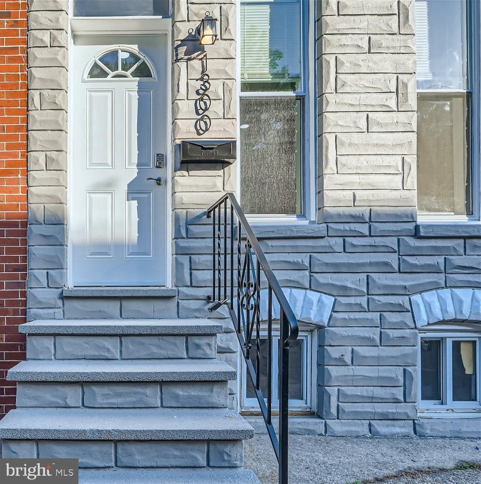 Welcome to this beautifully renovated, modern end-of-row townhome located in Baltimore's vibrant and historic Pigtown district! Blending classic charm with contemporary design, this home features spacious living areas, sleek finishes, and an abundance of natural light. Recent updates include a fully renovated kitchen with stainless steel appliances, luxurious bathrooms, and fresh flooring throughout. The open floor plan offers a perfect balance of style and functionality, making it ideal for both relaxing and entertaining. Enjoy the convenience of being just moments away from local shops, dining, and the charm of Baltimore's unique neighborhoods. Don’t miss your chance to own a piece of history with all the modern comforts!