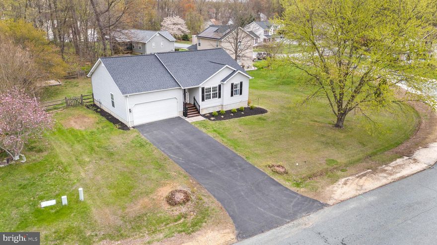 Welcome to 110 Winfield Drive, a rare find in the highly desirable Kensington Courts neighborhood of Elkton, Maryland. This charming ranch-style home offers the perfect combination of comfort, modern updates, and everyday convenience. Built in 1997 and situated on a spacious 0.34-acre lot, this well-maintained single-family residence features 3 bedrooms, 2 full bathrooms, and 1,210 square feet on the main floor—with a full basement offering additional space and endless possibilities.
Inside, you'll find an open floor plan ideal for today’s lifestyle. The inviting living room flows seamlessly to a rear deck, perfect for relaxing or entertaining. The kitchen has been stylishly updated with a butcher block island, subway tile backsplash, new countertops, a new refrigerator, and a new oversized double sink. Convenient access to the attached garage is available directly from the kitchen, as well as from the basement stairway.
Recent updates completed in 2021 bring fresh, contemporary touches throughout the home, including new ceiling fixtures, recessed lighting in the living room, and updated flooring and fixtures in both bathrooms. Each bedroom is equipped with a ceiling fan for added comfort. Outside, enjoy a fenced backyard and a new deck (added in 2021), offering a great space for outdoor gatherings or quiet evenings under the stars.
One of the standout features of this home is the new roof installed in 2023, featuring 50-year architectural shingles with a transferable warranty—providing lasting value and peace of mind. The home’s location also delivers unmatched convenience, with quick access to I-95, Route 40, and Route 213, making commutes to Newark, DE, Chesapeake City, and downtown Elkton a breeze. Nearby shopping, dining, parks, and recreational opportunities make everyday living both easy and enjoyable. This property is located within the Bohemia Manor Middle and High School feeder pattern for those interested in local school zoning.
110 Winfield Drive isn’t just a home—it’s a lifestyle. Don’t miss your chance to make it yours!
