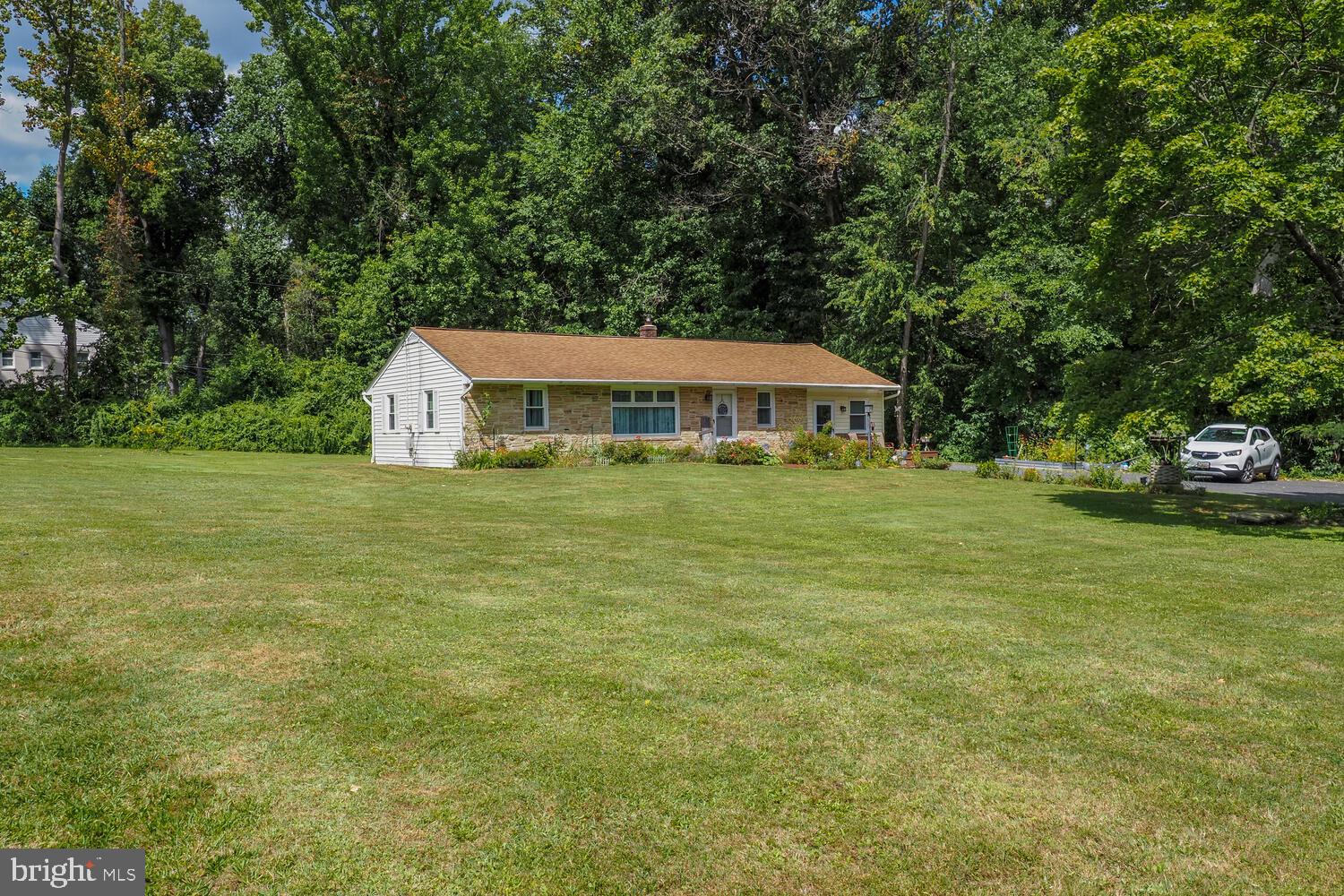 Charming Rancher on a flat 1.22 Acre Lot with Creek Frontage. Welcome to this move in ready 3 Bedroom, 2 Bath rancher nestled on a peaceful and private 1.22-acre flat lot. Next to a serene tree covered creek, this property offers the perfect blend of country charm and natural beauty, all just minutes from town. Updates include a new bathroom, new windows, new flooring, new water heater, and new refrigerator. Enjoy your morning coffee on the side deck while listening to the gentle sounds of the creek. The level yard offers endless possibilities: start a garden, build a shop, or simply enjoy the wide-open space. Conveniently located on Paradise Rd just minutes from Aberdeen, APG , I-95, Amtrak, and Havre de Grace.