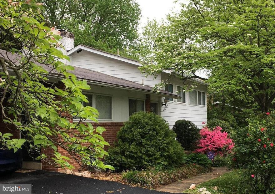 This cozy contemporary split-level home is conveniently located in the heart of McLean. It has 4 bedrooms, 3 full baths, vaulted living room ceiling, wood floor, fireplaces, ceiling fans, fenced backyard view with deck and patio, carport and expanded off-street driveway parking.  Possible earlier move-in.