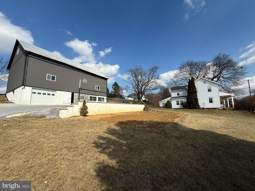 This property is being offered for sale at auction on Wednesday, April 23, 2025 at 5:00 PM. List price is the suggested opening bid only and is not indicative of the final sale price. Open House: Saturday, March 29, April 5 & 12 (1-3 pm.) or by appt. Terms: 10% down day of sale; settlement within 45 days of sale.

Beautifully situated 2 story farmhouse and bank barn w/2 horse stalls & insulated shop on .7 acres. This maintenance-free aluminum sided home has a quiet setting overlooking rural countryside with farmland valley views. The home contains approx. 1,830 SF consisting of a tiled floor entrance w/closet; living room w/hardwood floor; kitchen w/large windows; dining room w/hardwood floor; laundry room with vinyl plank floor; full bath; and a bedroom w/hardwood floor on the main level.  The upper level contains a master bedroom w/hardwood floor; bedroom w/hardwood floor; and a full bath w/ a clawfoot tub and shower. The home has an attic and basement, front porch; propane hot air heat; on site well and public sewer. The property also contains a 36 x 50 steel sided bank barn w/2 horse stalls, water, electric and a 14 x 33 insulated shop w/garage door & electric heater; a paved driveway w/extra parking; shade trees; landscaping; and a garden area. This property has gorgeous views of farmland valley and is in easy access of the PA Turnpike, restaurants and shopping. Sellers are moving out of state and are motivated to sell.