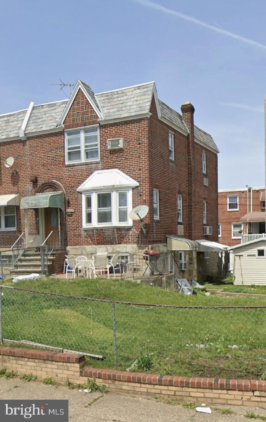 Beautiful end-unit row home in the heart of the Mayfair area. Spacious living room leading to an open concept kitchen that was upgraded to have more living space.  Upstairs you will find a master bedroom with a full bath, and two other nice sized bedrooms.  Finished basement with additional room and a full bath with plenty of storage. Things I love about his house: super spacious,  Large yard,  walking distance to shopping, restaurants, and transportation. This house is Sold As-is, set your appointment today to see this lovely home!