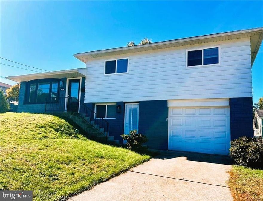 **OPEN HOUSE SATURDAY NOV 8th 11-1**  Beautifully renovated in 2023, this gently lived-in 3-bedroom, 1.5-bath home is tucked away in the desirable Minooka neighborhood! Enjoy new bathrooms and a stunning modern kitchen complete with appliances and built-in dining cabinetry, plus new flooring, windows, and doors. Additional improvements include updated electric, fresh paint inside & out, and new dimmable LED lighting throughout for a warm, customizable ambiance. Offering over 1,500 sq. ft. of finished living space, the home also features a 1-car built-in garage, concrete driveway, and efficient, economical gas heat, hot water, and clothes dryer. A covered back patio provides the perfect start for customizing a low-maintenance outdoor living space. Ideally located just a few blocks from the recently renovated Billy Barrett Park—featuring a playground, tennis, and brand-new pickleball courts—and close to local shopping, restaurants, Montage Mountain Resort, PNC Field (home of the RailRiders), Glenmaura National Golf Club, the Scranton Cultural Center, and major routes I-81, I-380, and the PA Turnpike. This move-in ready home won’t last long—schedule your personal showing today!