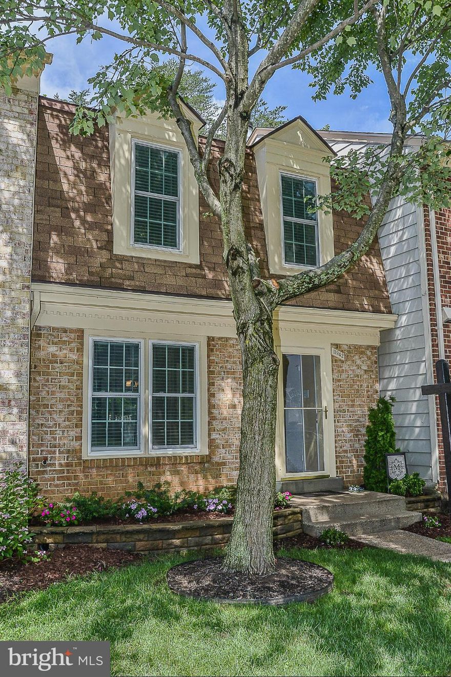 Beautiful open floor plan kitchen w,stainless steel, granite Counters,new hardwood floors. Walk out on main level to patio and backyard. New carpet, paint, and light fixtures. 2 Assigned Parking Spaces,Washer/Dryer, large utility room in basement.stunning Mater bath, Light and Bright, HOA yard maintenance fees paid for the rest of 2015.Walk to Fairfax Town center- Restaurants, Wegmans!