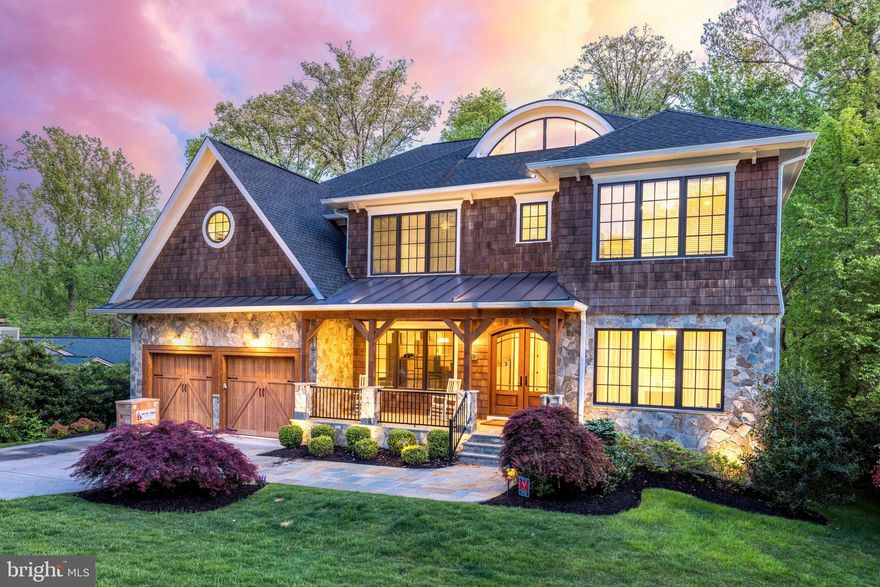 Stunning home shows like new. Spectacular views: backing to trees and Pimmit Run Parkland! Featuring over 7700 sf of luxury living with7 Bedrooms, 7 Full Bathrooms, 1 Half Bathroom. Spacious open floor plan that flows beautifully for entertaining inside and outside.  Four finished levels including loft and walkout basement. Main Level: Gourmet Kitchen, large island, inset cabinet fronts, Sub Zero Refrigerator, 48" 6 burner Wolf Range with double ovens, wall convection oven, built in coffee maker, and dishwasher. Large walk in pantry, Butler's pantry, Coffered Ceiling in the Family Room, coved ceilings with lighting, and wainscoting in the Foyer, Living Room, and Dining Room. Main Level Bedroom/Office en suite with built in bookshelves, Mudroom with cubbies. Basement: Full Bar including dishwasher, wine display storage area, gas fireplace, Bedroom with stunning back view, Fitness Room/2nd Basement Bedroom, pre-wired Theater Room, walk out to a stone patio and be surrounded by trees. Primary Bedroom with stunning tree views, vaulted tray ceiling, gas fireplace, sitting area, wet bar, large walk-in closets with built-ins. Secondary Bedrooms on 2nd level all include en suite bathrooms with luxury tile designs. Hardwood on main, second, and loft levels, Security system with cameras, and lawn sprinkler system. Located in sought after Salona Village just blocks to the center of McLean, playgrounds, parks and elementary school.