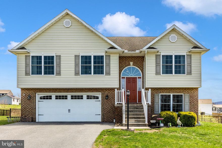 You’ll love coming home to this beautifully updated split-level that checks all the boxes for comfort, style, and space. The main level has been upgraded with brand-new luxury vinyl plank (LVP) flooring, offering a sleek and durable finish that complements the home’s open-concept layout and airy vaulted ceilings. Fresh paint throughout and freshly cleaned carpets add to the move-in ready feel the moment you step inside.

Downstairs, a generous flex space opens up a world of possibilities—create the home office, gym, playroom, or cozy movie lounge you’ve always wanted. With 3 bedrooms and 2.5 bathrooms, there’s room for everyone to have their own space, and the primary suite offers a private bathroom and large walk-in closet for added comfort.

But the real showstopper? The backyard. This home boasts one of the largest fully fenced yards in the community—perfect for pets, play, gardening, or gatherings around the fire pit. A spacious deck overlooks the yard and offers the ideal setup for grilling or relaxing.

An oversized 2-car garage provides great storage opportunities, and the home is equipped with central A/C and an electric heat pump, with natural gas available for future conversion.

Just minutes from schools, the hospital, grocery stores, and charming downtown shopping, this home blends updated comfort with a location that truly delivers. Don’t miss your chance to snag this standout property in this sought after neighborhood!