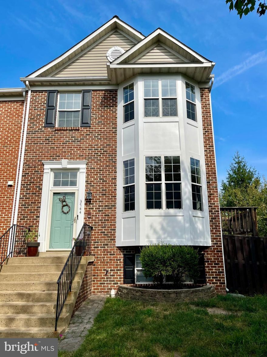Welcome Home to this lovely first time rental in Lake Ridge.  The end unit townhouse boosts of natural light gleaming on the hardwood floors on the main level.  An open concept dining/living space and an renovated kitchen with ceiling height cabinets, a large island, and equally large pantry and eat in dining area which leads to the large deck and down to the stamped concrete patio.  Upstairs you will find three generous sized bedrooms, the primary with vaulted ceiling , an updated primary bathroom ensuite, and large walk in closet.  There is a four piece hall bath along with the washer and dryer.   In the basement, there is a 4th bedroom, a full bathroom and a large open space for entertaining.  There is a fireplace and walkup basement access.