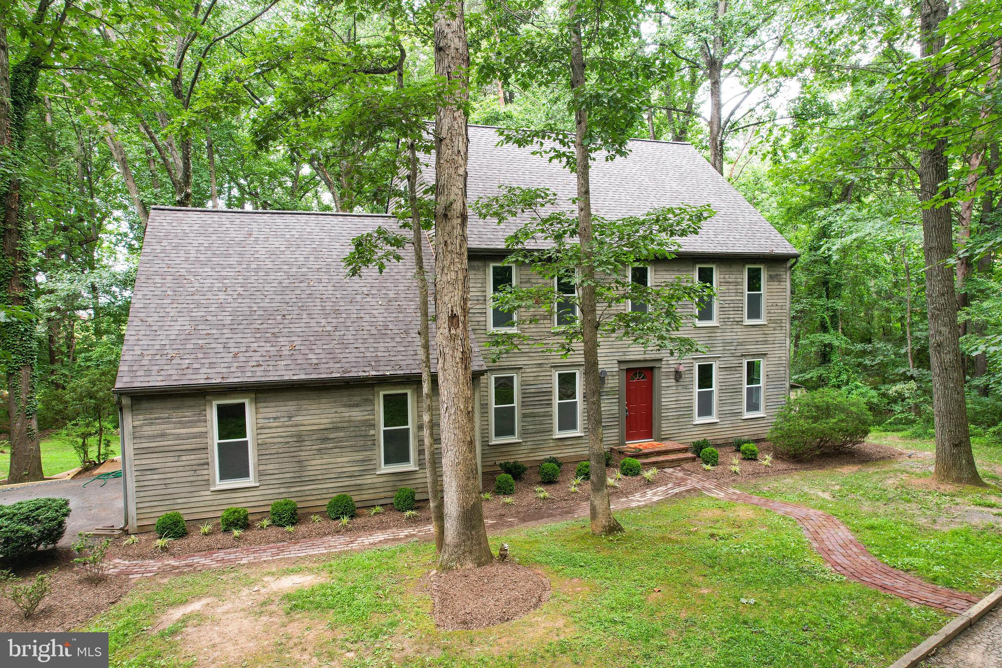 Charming New England Colonial in Private Dayton Setting
Nestled at the end of a quiet cul-de-sac in the sought-after Dayton Meadows community, this lovely New England-style Colonial offers the perfect blend of timeless charm, spacious living, and modern convenience—all set on a serene wooded lot that provides exceptional privacy and natural beauty.
From the moment you arrive, the home exudes classic New England character. Inside, a generous and thoughtfully designed layout offers over 3,000 square feet of living space. As you step through the front door, you’re welcomed by a foyer with a dedicated home office on the left—ideal for today’s remote work needs. To the right, the formal living room and dining room offer ample space for entertaining or quiet evenings at home.
The heart of the home is the spacious country eat-in kitchen, featuring updated appliances, abundant cabinetry, and generous counter space—perfect for both everyday meals and holiday gatherings. Adjacent to the kitchen is a large family room with a wood-burning fireplace, providing a cozy place to unwind. A convenient side-entry garage opens directly into the large kitchen making unloading groceries a breeze. A powder room completes the first floor. Hardwood floors run throughout the entire main level, adding warmth and elegance.
Upstairs, you’ll find four well-sized bedrooms, including a large primary suite with private bath, and a second full bath. Plush carpeting throughout the upper level adds comfort. One of the home's most unique features is the expansive fully finished 3rd floor loft, could be used as a 5th bedroom, drenched in natural light from multiple skylights—also a perfect space for a studio, playroom, gym, or guest retreat.
The unfinished basement offers endless potential for customization, whether you envision a media room, workshop, or additional living space, 2 full size windows and walk out level make the possibilities endless. Another rare find is the three garages, once used by a car enthusiast for restoring vehicles. The extended driveway wraps from the front of the house down to the side 2-car garage entrance, offering easy access and ample parking. On the opposite side of the home you will find the 3rd garage.
Enjoy peace of mind with recent updates, including a new roof, new windows, New HVAC, resurfaced pool deck, updated well & septic in 2023 and modernized appliances. Whether relaxing poolside, working from home, or entertaining guests, this home offers comfort, style, functionality and privacy. Not to mention this is the only lot on the cul-de-sac with natural gas.
Escape to your own private retreat on this stunning 3.48-acre wooded lot, surrounded by mature landscaping and natural beauty. Tucked away for ultimate privacy, the property features a beautifully maintained concrete, in-ground pool with a recently resurfaced deck—ideal for summer relaxation or entertaining family and friends. Whether you're seeking peace and quiet or a perfect space to host gatherings, this serene setting offers the best of both worlds.
Located in the heart of Howard County, this property is commuter-friendly, with easy access to major routes for a smooth drive to Columbia, Baltimore, Frederick and Washington, D.C. Enjoy the tranquility of country living without sacrificing convenience to city amenities, shopping, and dining.
Don’t miss this rare opportunity to own a one-of-a-kind property that offers classic charm, space to grow, and thoughtful updates—all in a picturesque and private setting in Dayton.
