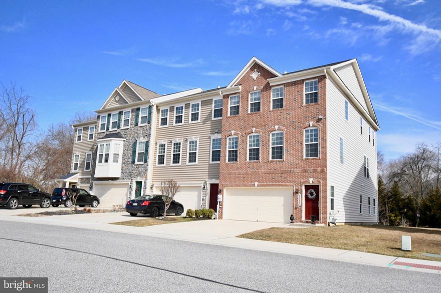 Spacious, Gracious, Luxurious.  Stunning End of Group townhome in very convenient location. Lightly lived in since it was built. 3 finished levels, all above grade. Upper Level, main living area provides an open floor plan with beautiful Somerset Plank, solid oak-Kona colored hardwood floors, gas fireplace/mantle, coffee bar and 9' ceilings. Gorgeous kitchen is large, includes 42" cherry cabinets, double oven, huge island with granite counters and is an ideal spot to gather with family & friends. Morning Room off Kitchen has gas fireplace and access to nice deck. Master Suite offers Walk in closet and spa-like bath with soaking tub and separate shower. Lower Level Recreation Room offers full bath, lots of natural light w/walk-out to yard. Many energy efficient features that will save you money!  Ideal home for a busy lifestyle.