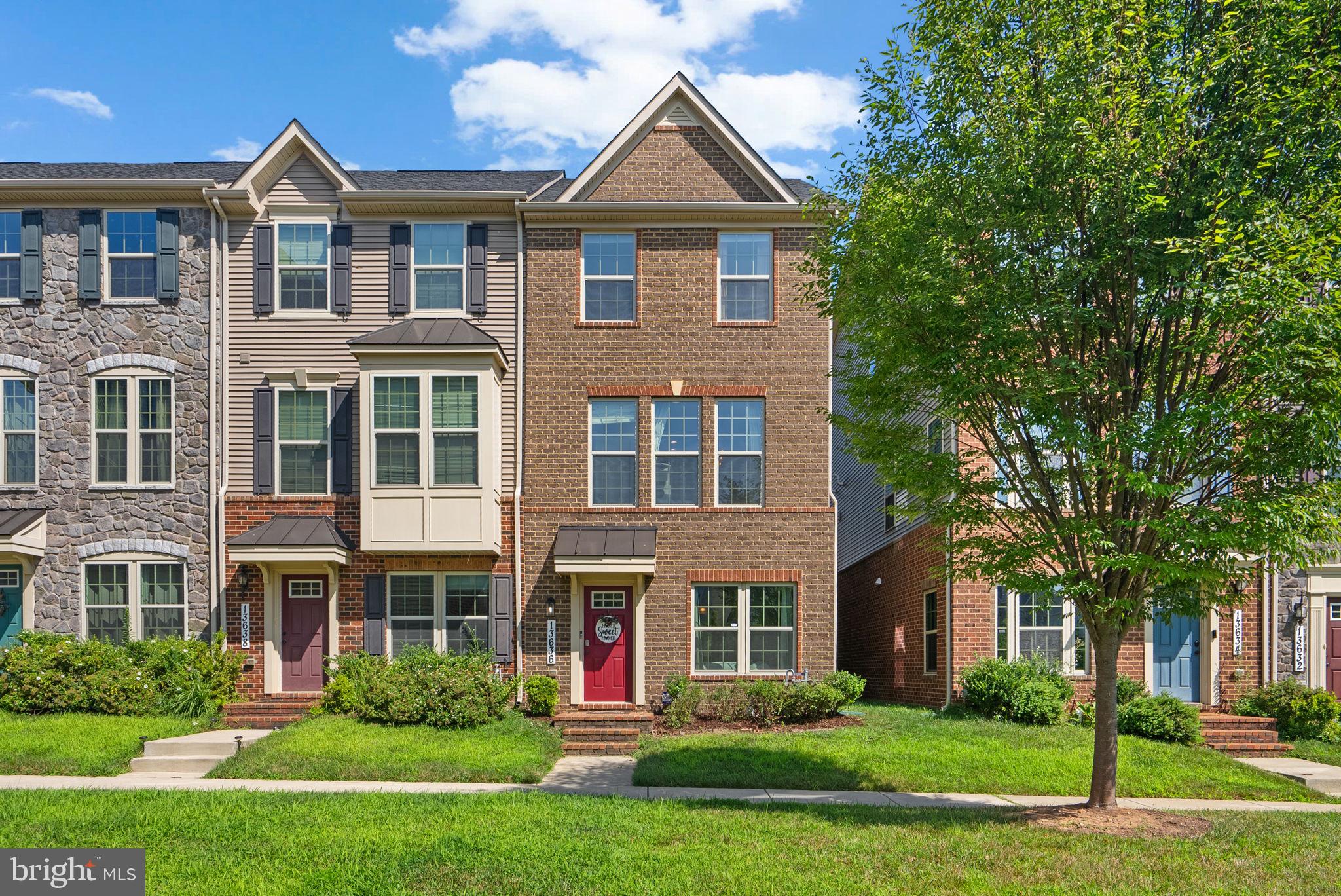 Welcome to this stunning brick-front end unit townhome located in the highly sought-after Cabin Branch community of Clarksburg. Perfectly positioned facing a peaceful green space, this beautifully appointed home offers spacious, light-filled interiors, high-end finishes, and thoughtful upgrades throughout. The entry level features gleaming hardwood floors, a welcoming foyer, and a versatile office or recreation room with recessed lighting. A private bedroom with a generous closet and access to a full bath—featuring ceramic tile flooring, a single vanity, and a tub/shower combination—is ideal for guests or multi-generational living. Additional conveniences include a large guest closet, storage closet, and access to the two-car garage equipped with an Level 2 EV charger. A hardwood staircase leads to the expansive main level, where hardwood floors flow seamlessly throughout. The gourmet kitchen is a chef’s dream, showcasing white shaker cabinetry, granite countertops, stainless steel appliances including a gas cooktop, double wall oven, built-in microwave, dishwasher (recently replaced), and a side-by-side refrigerator. The large island with pendant lights, breakfast bar, and deep single-bowl stainless undermount sink provides both beauty and function. A double pantry offers abundant storage space.
Enjoy meals in the sunlit dining area enhanced by a stylish chandelier, recessed lighting, and large windows along the front and side walls. The spacious living/family room features recessed lighting, built-in speakers, hardwood floors, and a French door that opens to a generous composite deck—perfect for entertaining or relaxing outdoors. The upper level features recently replaced carpeting and a luxurious owner’s suite complete with a tray ceiling with crown molding, sitting area, ceiling fan, recessed lighting, and two walk-in closets. The spa-inspired owner’s bath offers dual granite vanities, ceramic tile flooring, a walk-in shower, and a private water closet. Two additional bedrooms offer spacious closets and share a hall bath with ceramic tile flooring, a tub/shower combination with decorative listello, and a granite-topped vanity. A convenient laundry area with washer and dryer completes the upper level. Additional features include a tankless hot water heater, high-efficiency furnace, window blinds, wiring for wall-mounted TVs, and a security system. This exceptional home offers luxury, comfort, and modern convenience in one of Clarksburg’s most desirable neighborhoods. Don’t miss it!