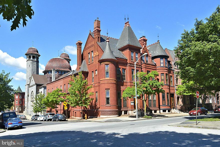 Grand (almost 18,000 sq.ft.) Victorian with 2 separate entrances: 1900 Eutaw Pl., currently the Owner's residence, & 300 Robert St, the Tenants' complex. Each with own private entrance/mailing address. Respectfully maintained. Attached 4 car garage. Keep in its current multi-family scenerio, or divide Owner's Residence into additional units, foundation headquarters, condo conversion - FLEXIBLE!