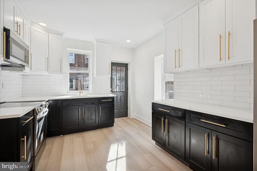 Welcome to 5228 Florence Street, a fully reimagined 3-bedroom, 2.5-bath home offering  1,290 sq ft of above-grade living space plus an additional  645 sq ft of fully finished basement, delivering over 1,900 sq ft of total finished, usable space.

This property underwent a true full gut renovation, thoughtfully rebuilt from top to bottom with attention to both form and function. The open main level features high-end luxury vinyl plank flooring, premium paint finishes, high-end trim-work and a beautifully designed kitchen with luxury modern cabinetry, quality appliances, and clean, timeless styling ideal for everyday living and entertaining.

Upstairs offers three comfortable bedrooms and well-appointed bathrooms finished with durable, modern materials. The fully finished basement provides valuable additional living space, perfect for a home office, gym, media room, or guest area and is supported by a brand-new basement foundation, a rare and meaningful upgrade that adds long-term structural confidence.

The fully finished basement significantly expands the home’s functionality and includes a private office or guest bedroom, a full bathroom, dedicated storage, and flexible living space ideal for a home office, gym, media room, or extended living area. The basement is supported by a a re-done foundation wall, and re-done concrete floors, a rare and meaningful upgrade that adds long-term structural confidence.

All major systems have been replaced, including brand-new HVAC, electrical, plumbing, and an updated roof, allowing the next owner to move in without concern for maintenance. The home is FHA and VA loan eligible, making it an excellent opportunity for first-time buyers.

A thoughtfully rebuilt, truly move-in-ready home in a convenient West Philadelphia location. Schedule your showing today.