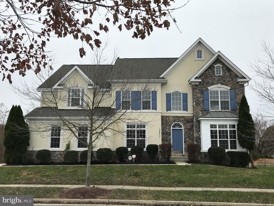 Luxury Remodeled Colonial with 6 Bedrooms, 4 Full and 1 Half Bathrooms, and Fully Finished Walkout Basement. Eat in Kitchen, Formal Living, Formal Dining Room, Family Room with Cathedral Ceiling, Office, and Half Bath on 1st Floor. 1st Floor Laundry Room and Side load 2 Car Attached Garage. The upper level has a massive Master Bedroom with Tray Ceiling and 2 Walk-in Closets, huge Master Bathroom with large Soaker Bathtub and Water Closet, 3 additional Bedrooms and 2 additional Full Bathrooms. The lower level  Fully Finished Walkout Basement has a gigantic Family Room w/Wet Bar, 2 Bedrooms and a Full Bath. Move in immediately.